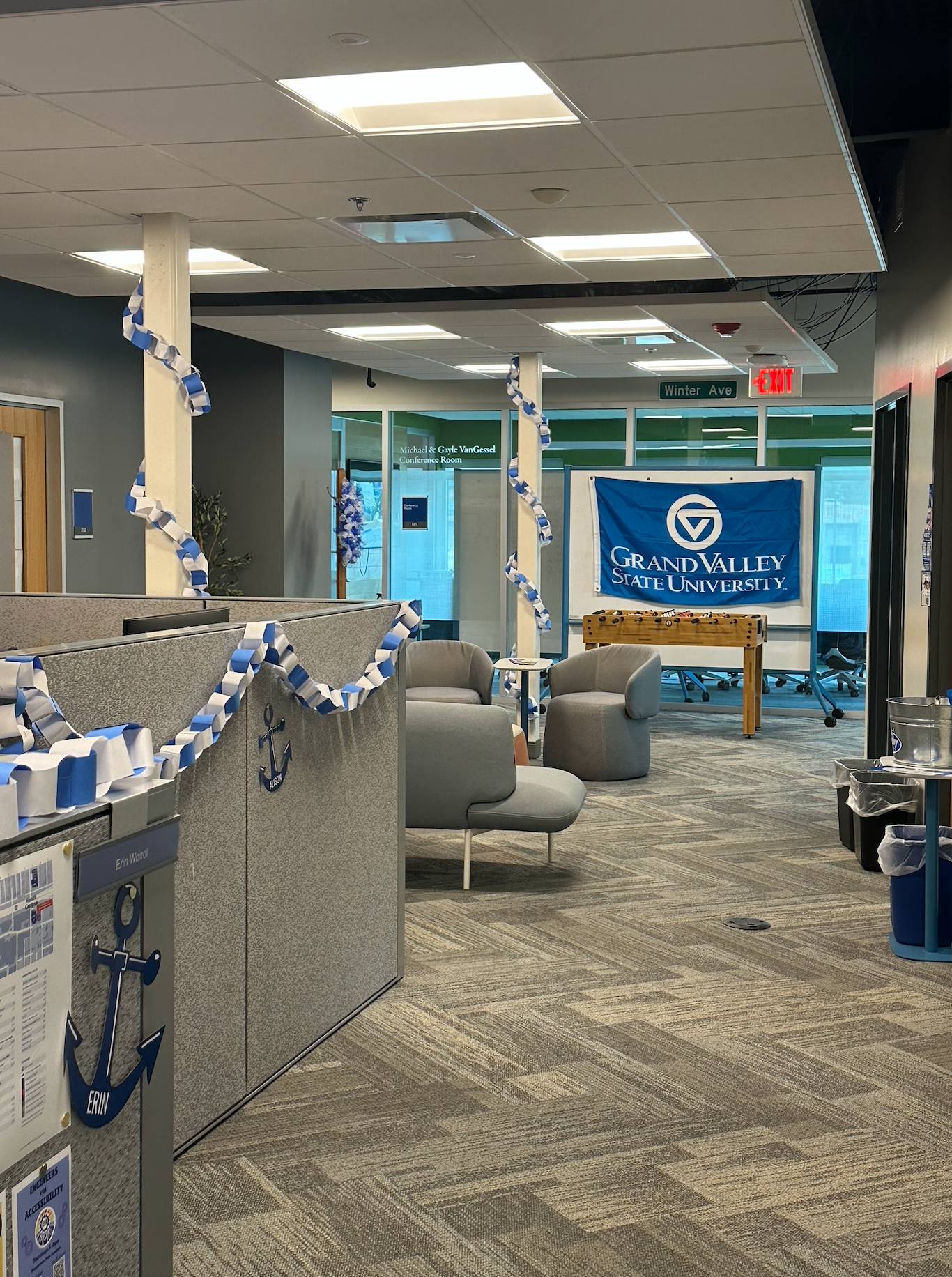 PCE Homecoming decorations, paper garland hung in office